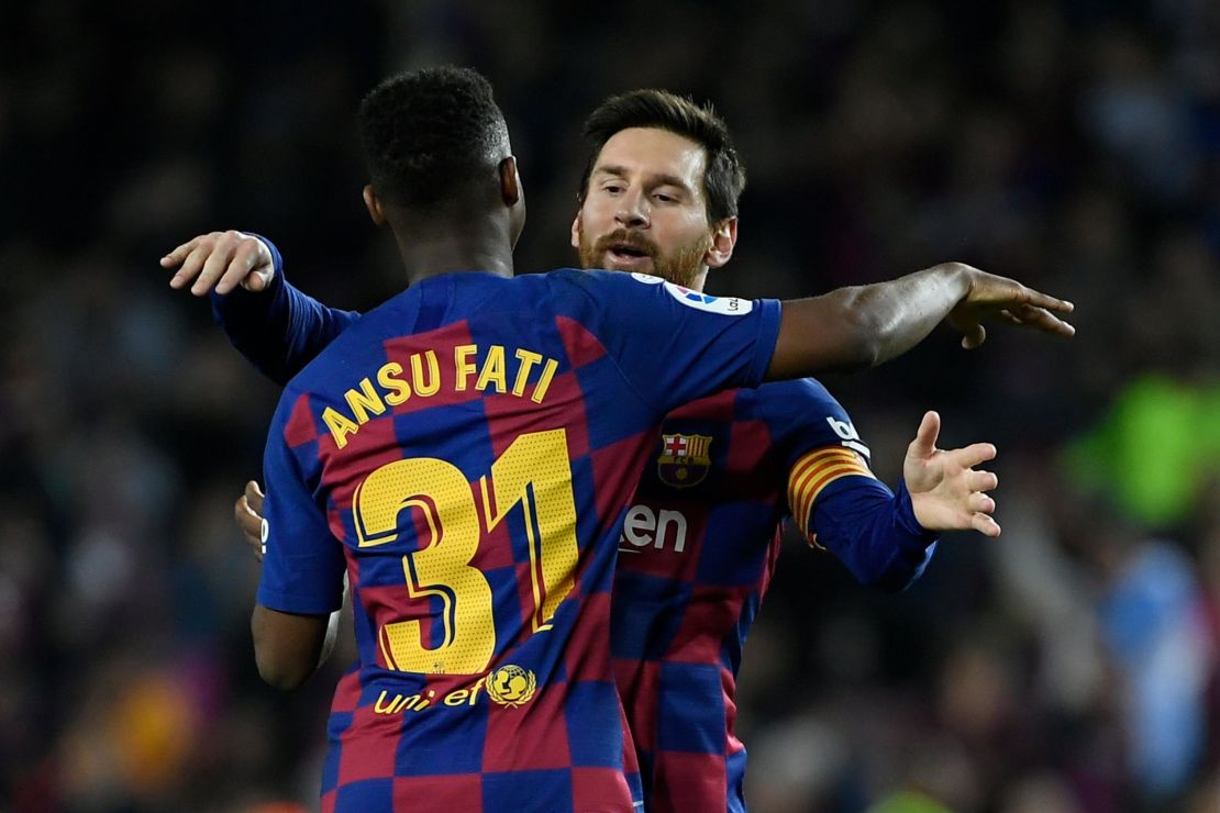 Ansu Fati celebrateshis goal with Lionel Messi.