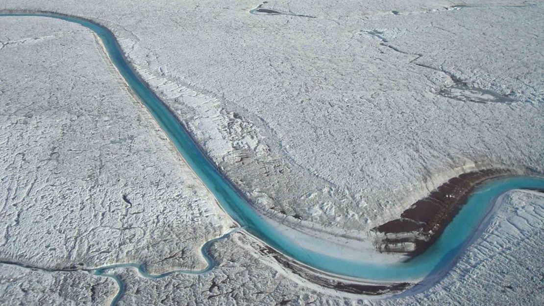 Another view of the 50-mile-long glacier tongue shows torrential meltwater streams making their way toward the ocean. 