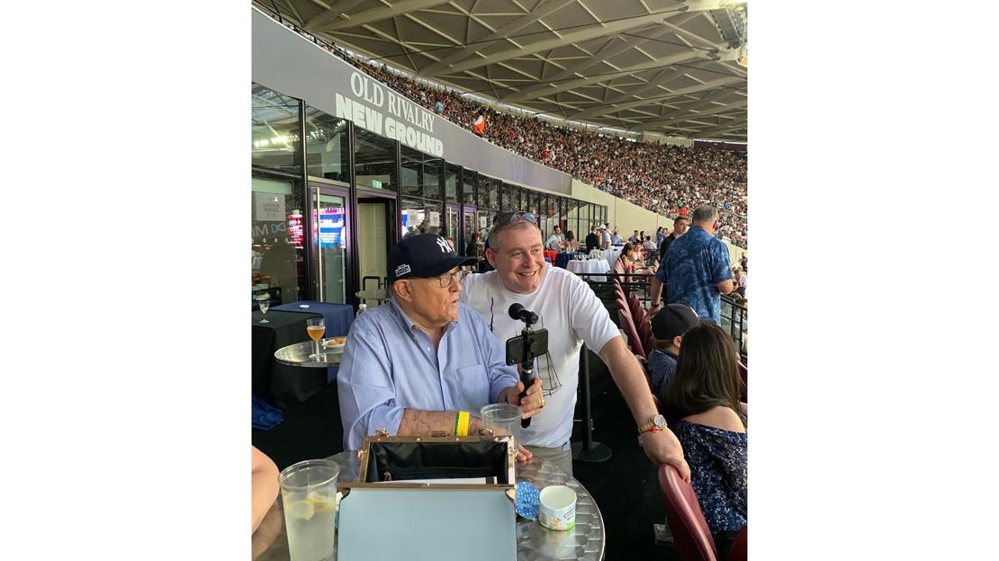 Rudy Giuliani and Lev Parnas at a New York Yankees game in London in June 2019