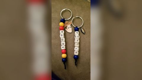 Keoni's key chains go for $5 each. He has sold over 300 key chains. 