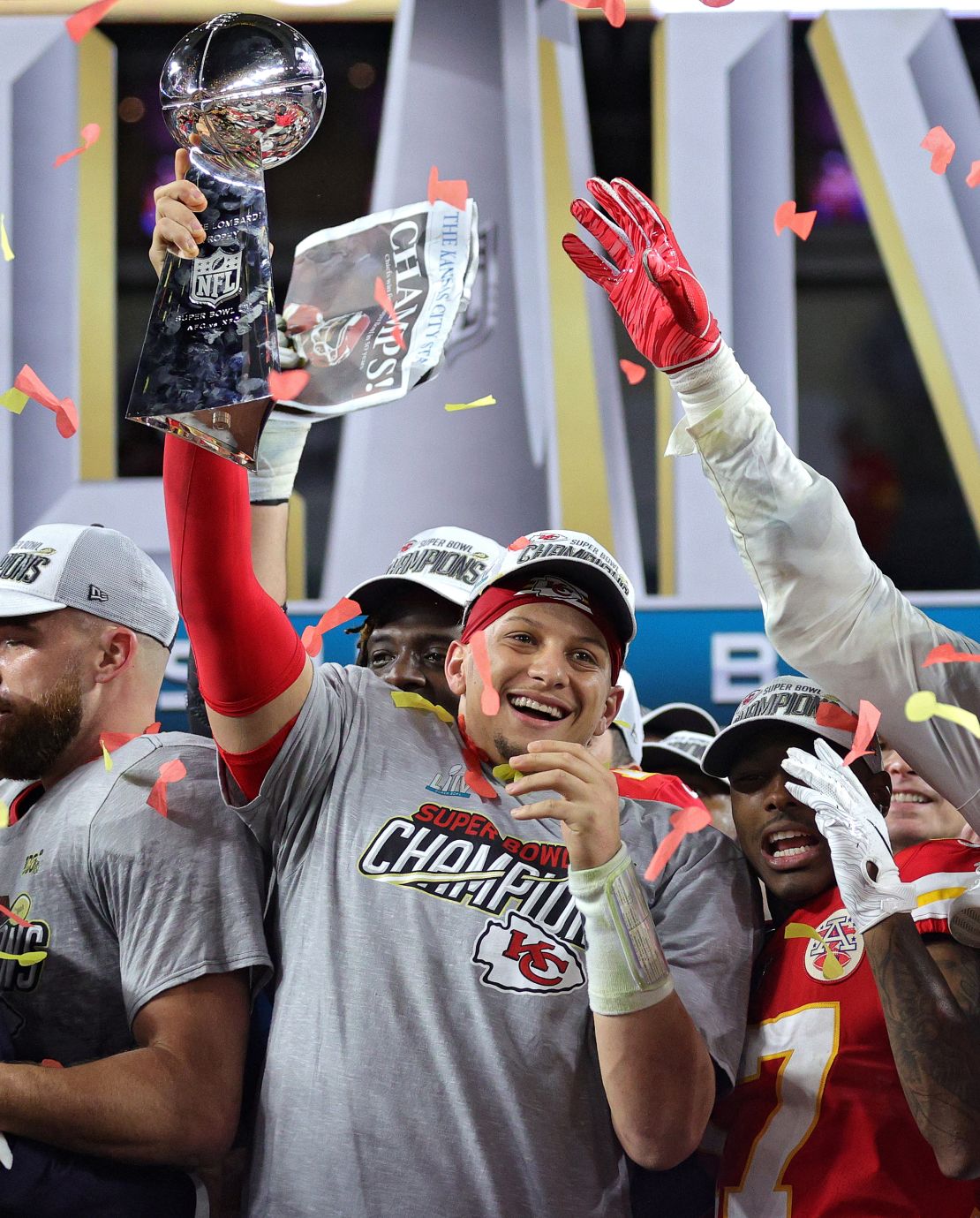 Patrick Mahomes of the Kansas City Chiefs raises the Vince Lombardi Trophy after defeating the San Francisco 49ers in Super Bowl LIV.