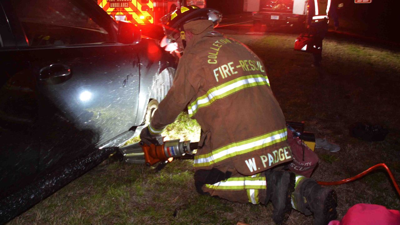 Rescue teams used several tools, including a hydraulic spreader, to free the woman.