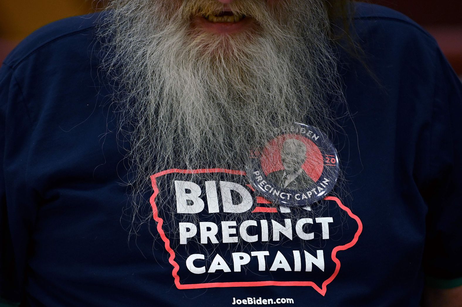 A precinct captain for Biden prepares for a caucus in Des Moines.