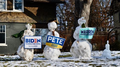 Snowmen in Des Moines are dressed as Biden, Buttigieg and Warren on February 3.