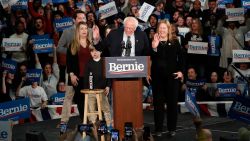 Democratic presidential candidate Sen. Bernie Sanders, I-Vt., with his wife Jane O'Meara Sanders, speaks to supporters at a caucus night campaign rally in Des Moines, Iowa, Monday, Feb. 3, 2020. (AP Photo/Pablo Martinez Monsivais)