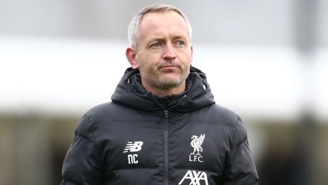 Neil Critchley looks on during the Premier League International Cup match between Liverpool U23 and Paris Saint-Germain U23.