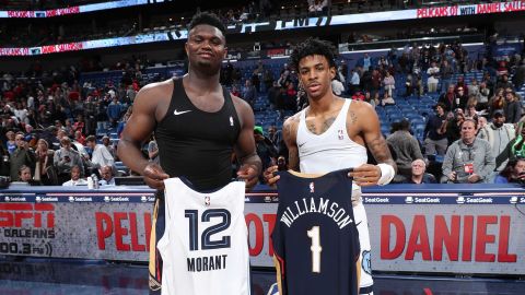 Williamson (left) and Morant swapped jerseys after the game.