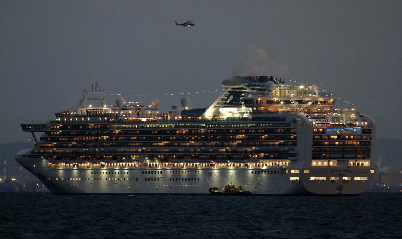 The Diamond Princess cruise ship sits anchored in quarantine off the port of Yokohama on February 4. It arrived a day earlier with passengers feeling ill.