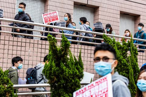 Striking hospital workers in Hong Kong demand the closure of the border with mainland China on February 4.