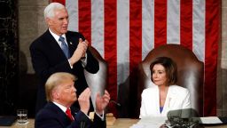 President Donald Trump and Vice President Mike Pence turns and applaud as he delivers his State of the Union address to a joint session of Congress on Capitol Hill in Washington, Tuesday, Feb. 4, 2020, as House Speaker Nancy Pelosi of Calif., watches. (AP Photo/Patrick Semansky)