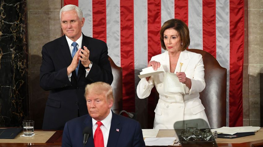 US Vice President Mike Pence claps as Speaker of the US House of Representatives Nancy Pelosi rips a copy of US President Donald Trump speech after he delivers the State of the Union address at the US Capitol in Washington, DC, on February 4, 2020. (Photo by MANDEL NGAN / AFP) (Photo by MANDEL NGAN/AFP via Getty Images)