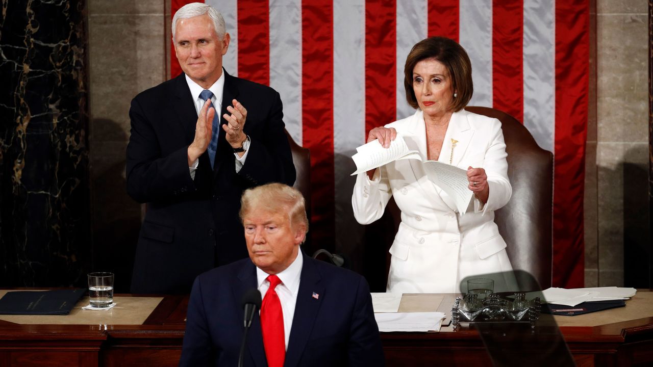 Speaker Nancy Pelosi tears her copy of President Donald Trump's State of the Union address after he delivered it to a joint session of Congress on February 4, 2020.