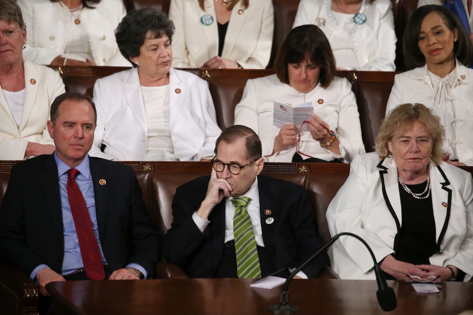 House impeachment managers -— from left, Reps. Adam Schiff, Jerry Nadler and Zoe Lofgren — sit together during the speech.