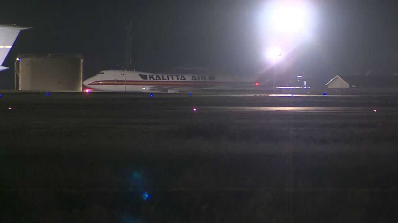 One of the charter flights taxis at Travis Air Force Base after landing on Wednesday morning.