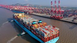 Tugboats guide a container ship of Maersk Line at the Yangshan Deepwater Port, operated by Shanghai International Port ( Group) Co., Ltd. (SIPG), on October 4, 2019 in Shanghai, China.