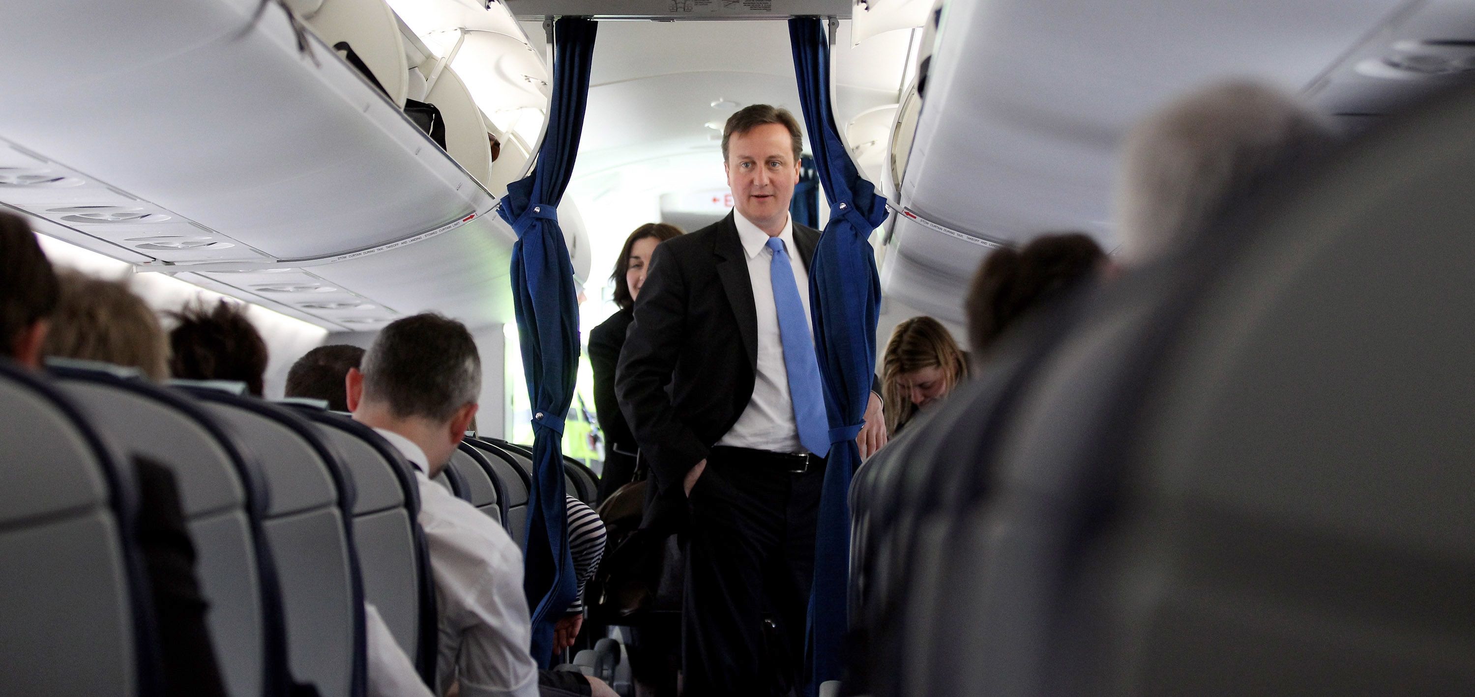 Former UK PM's bodyguard forgets gun in plane toilet