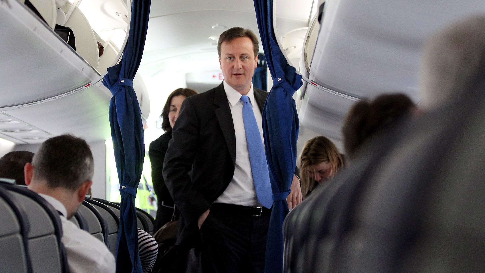 David Cameron on board a flight in 2010, when he was Conservative Party leader