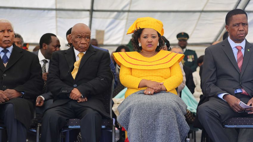 Newly appointed Lesotho prime Minister Thomas Thabane (L), leader of the All Basotho Convention (ABC) political party, his wife Maesaiah Ramoholi Thabane and Zambian President Edgar Lungu (R) attend Thabane's inauguration on June 16, 2017 in Maseru.
Lesotho's new prime minister took office at the head of a coalition government, three years after he was targeted by a putsch and two days after the murder of his estranged wife. / AFP PHOTO / SAMSON MOTIKOE        (Photo credit should read SAMSON MOTIKOE/AFP via Getty Images)