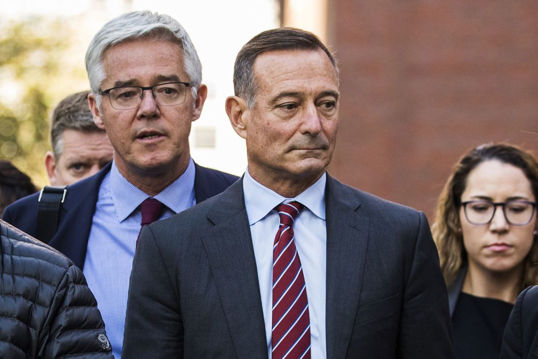 Douglas Hodge, former CEO of PIMCO, exits federal court on October 21, 2019, in Boston.