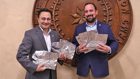 Cherokee Nation Principal Chief Chuck Hoskin Jr. and Secretary of Natural Resources Chad Harsha with heirloom seeds being sent to the Svalbard Global Seed Vault.