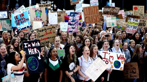 Schoolchildren march during a climate change protest in Auckland, New Zealand. Figueres believes protests like this one will bring about change. 