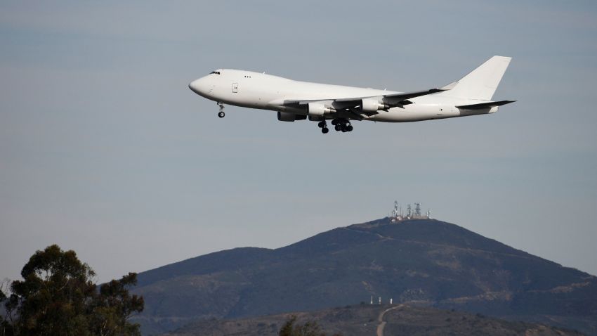 An aircraft, chartered by the U.S. State Department to evacuate Americans from the novel coronavirus outbreak in the Chinese city of Wuhan, arrives at Marine Corps Air Station Miramar in San Diego, California, U.S., February 5, 2020.     REUTERS/Denis Poroy