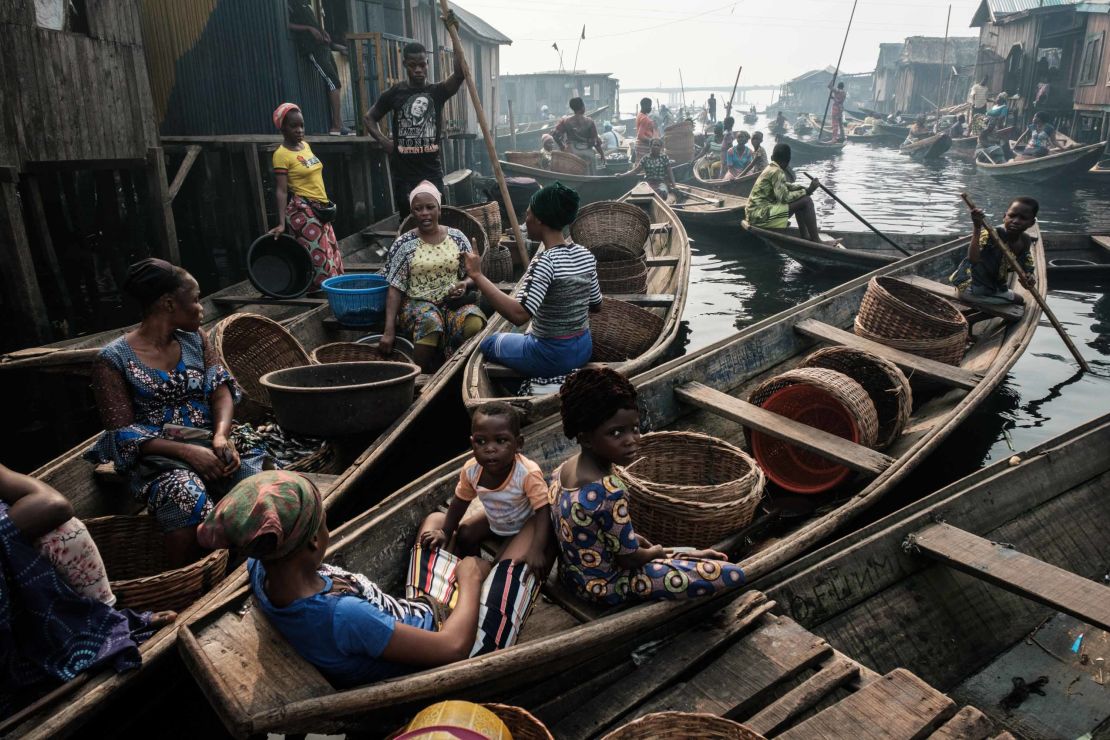 Fishermen and women on a waterway in the Makoko on March 2, 2019.