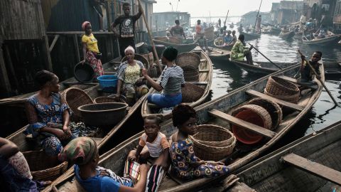 Fishermen and women on a waterway in the Makoko on March 2, 2019.