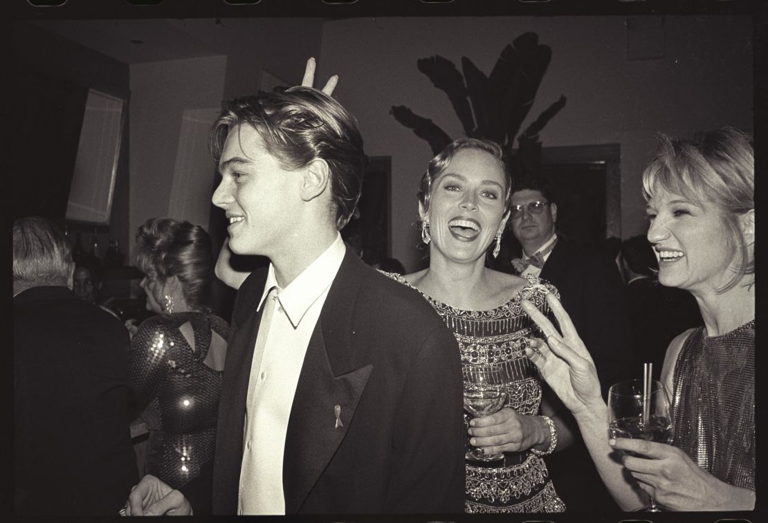 Leonardo DiCaprio, Sharon Stone & Ellen Barkin at Producer Steve Tisch & Vanity Fair's Oscar Night Party, March 1994.