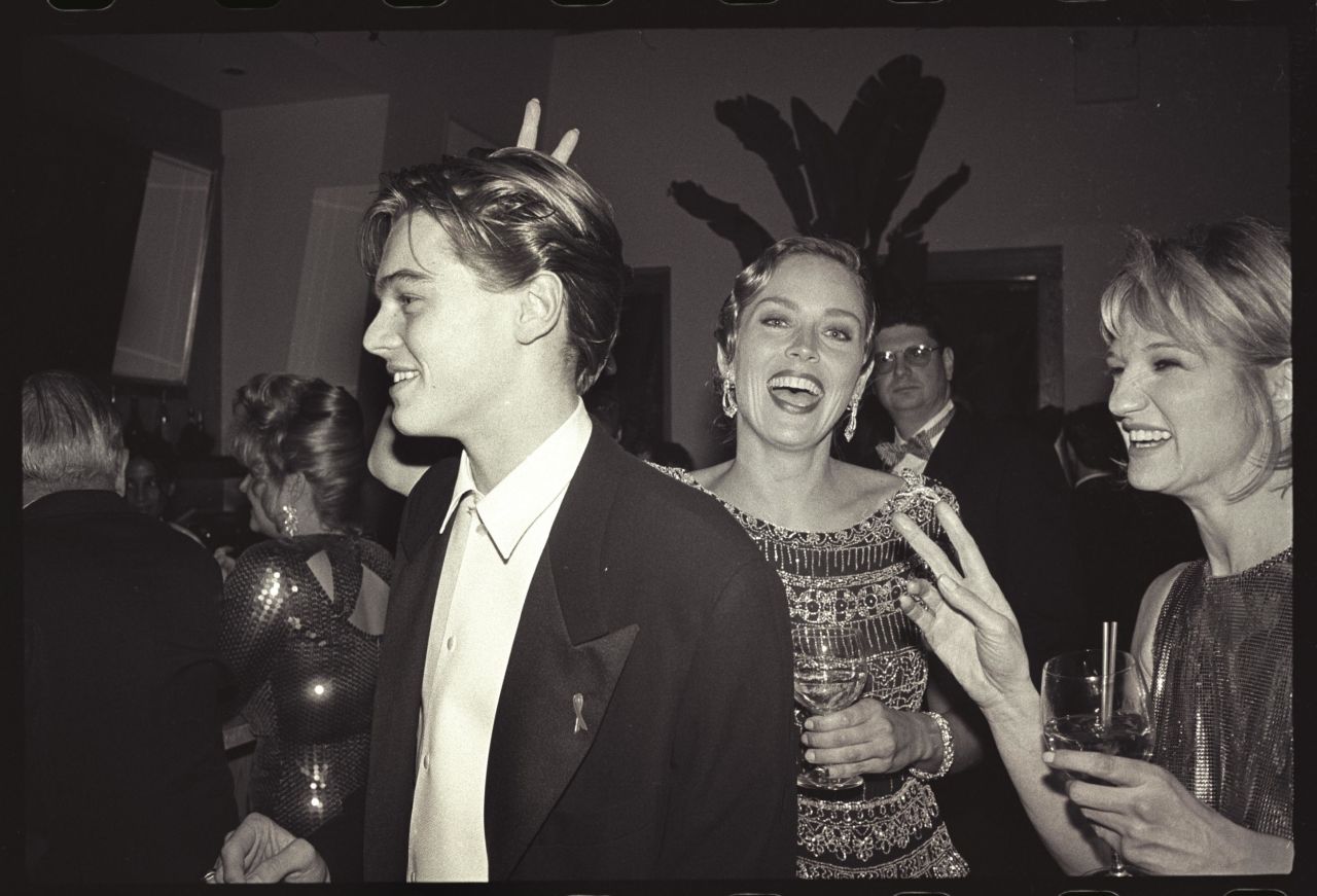 Leonardo DiCaprio, Sharon Stone & Ellen Barkin  at  Producer Steve Tisch &  Vanity Fair's Oscar Night Party, March 1994.
