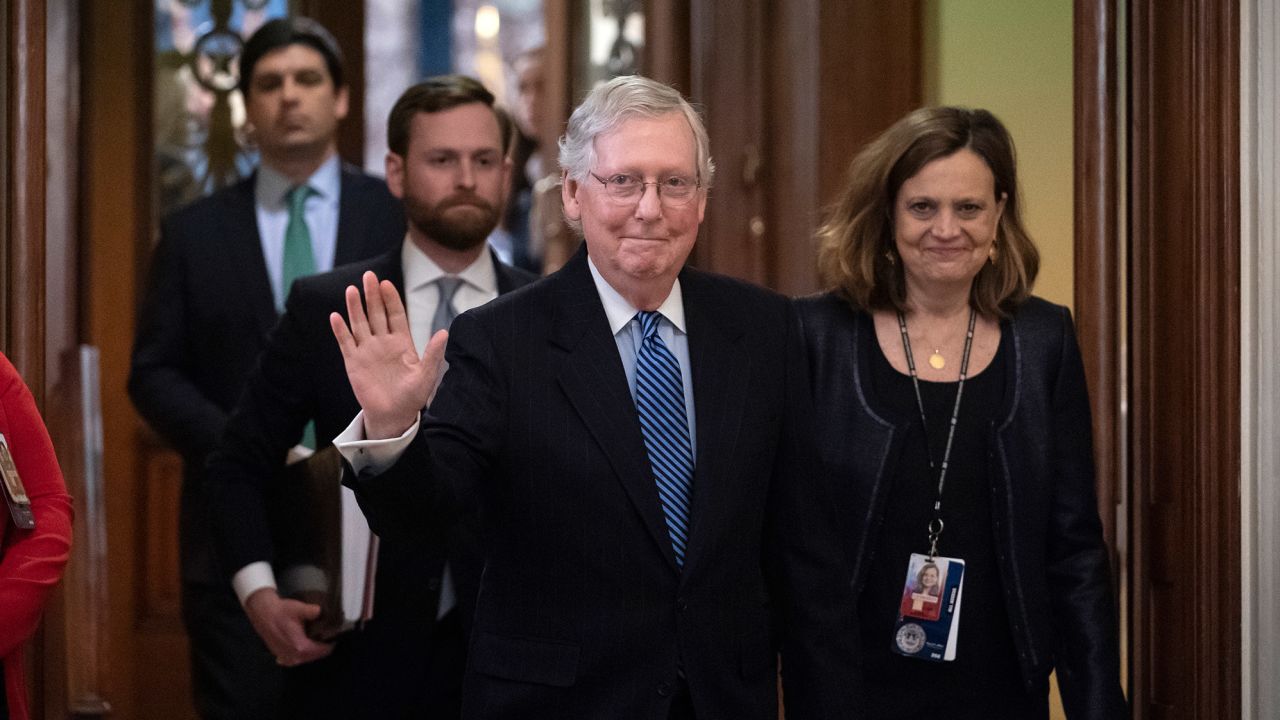 Senate Majority Leader Mitch McConnell, R-Ky., leaves the chamber after leading the impeachment acquittal of President Donald Trump.