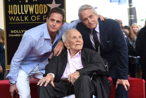 Three generations of Douglas actors — from left, Cameron, Kirk and Michael —pose for a photo as Michael received a star on the Hollywood Walk of Fame in 2018.
