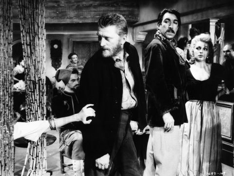 Douglas stars as Vincent van Gogh in director Vincente Minnelli's film about the Dutch painter, "Lust for Life" (1956). Co-star Anthony Quinn, right, won the best supporting actor Oscar for his role as rival Paul Gauguin.