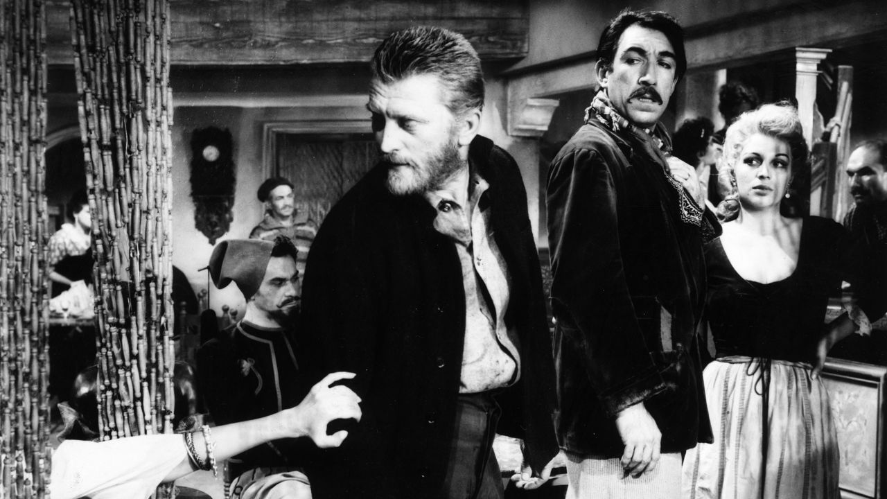 1956:  American actor Kirk Douglas (left) and actor Anthony Quinn (1915 - 2001; right) in a still from director Vincente Minnelli's film 'Lust for Life', in which Douglas plays Vincent Van Gogh and Quinn plays Paul Gauguin.