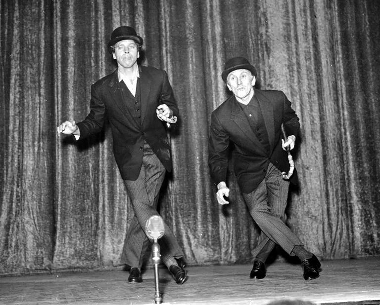 Douglas, right, rehearses with Burt Lancaster in preparation for the "Night of 100 Stars" event in London in 1958. The two stars appeared in five films together, from "Gunfight at the O.K. Corral" (1957) to "Tough Guys" (1986).