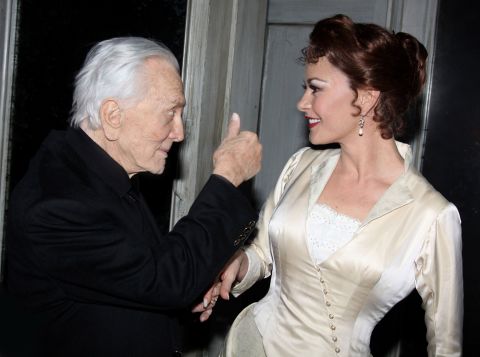 Douglas greets his daughter-in-law Catherine Zeta-Jones backstage at Broadway's "A Little Night Music" in 2009. She was starring in a revival of the Stephen Sondheim-Hugh Wheeler musical.