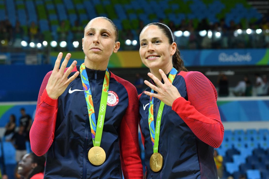 USA pair Diana Taurasi (L) and Sue Bird pose with their gold medals after the final of the women's basketball competition at the Carioca Arena 1 in the 2016 Olympics Games in Rio.