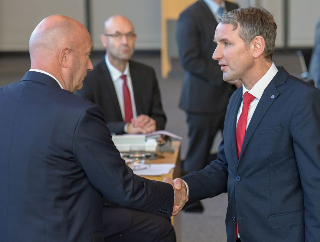 The Chairman of far-right AfD party group in Thuringia, Bjoern Hoecke (right) congratulates Thomas Kemmerich, leader of the state branch of Thuringia's Free Democratic Party and newly elected Prime Minister of Thuringia.