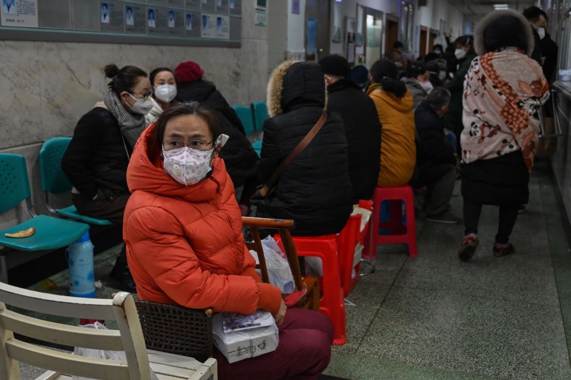 People wait for medical attention at Wuhan Red Cross Hospital in Wuhan on January 25, 2020. 