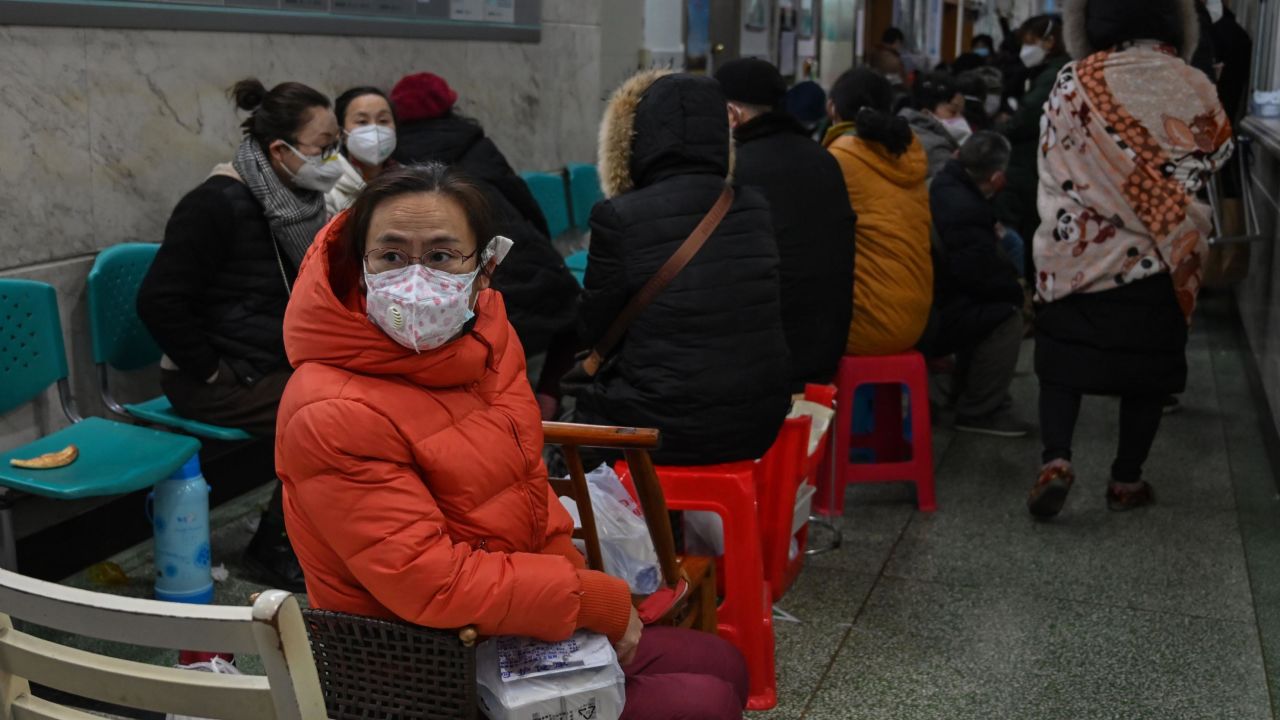 People wait for medical attention at Wuhan Red Cross Hospital in Wuhan on January 25, 2020. 