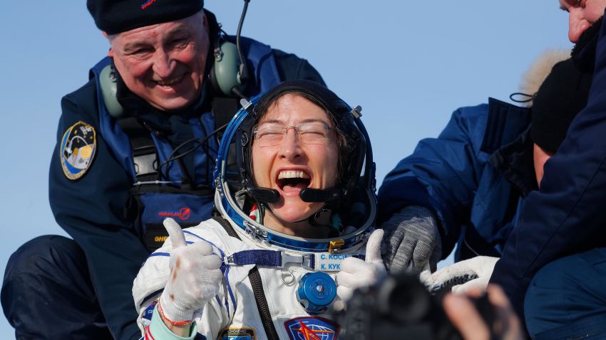 NASA astronaut Christina Koch reacts shortly after landing in a remote area outside the town of Dzhezkazgan (Zhezkazgan), Kazakhstan, on February 6, 2020. - NASA's Christina Koch returned to Earth safely Thursday having shattered the spaceflight record for female astronauts after almost a year aboard the International Space Station. Koch touched down at 0912 GMT on the Kazakh steppe after 328 days in space along with Luca Parmitano of the European Space Agency and Alexander Skvortsov of the Russian space agency. (Photo by Sergei ILNITSKY / POOL / AFP) (Photo by SERGEI ILNITSKY/POOL/AFP via Getty Images)