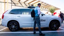 An Uber self driving car sits on display ahead of an Uber products launch event in San Francisco, California on September 26, 2019. - Uber on Thursday unveiled a new version of its smartphone app that weaves together services from shared rides to public transit schedules while adding more security features. The upgraded app is intended to let Uber users see, and ideally tap into, the company's array of options for getting around or having restaurant meals delivered. (Photo credit should read PHILIP PACHECO/AFP via Getty Images)
