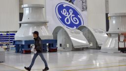 An employee is seen on November 21, 2017 in Montoir-de-Bretagne, western France, at a factory of US company General Electric. (Photo credit should read Loic Venance/AFP via Getty Images)