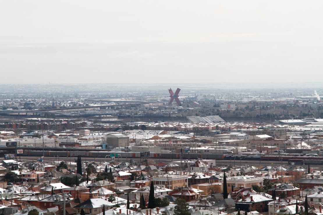 Snow covers rooftops on either side of the U.S.-Mexico border as seen on Wednesday, from El Paso, Texas. 