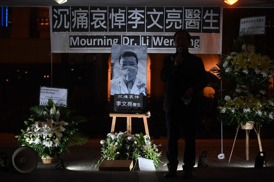 People attend a vigil in Hong Kong on February 7, 2020 for  whistleblowing doctor Li Wenliang, 34, who died in Wuhan after contracting the virus while treating a patient. 