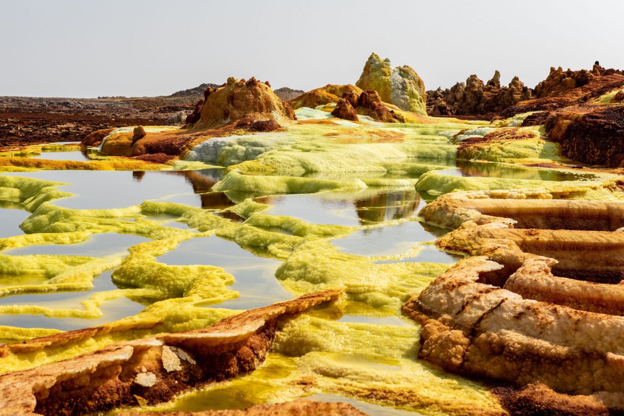 <strong>Danakil Depression:</strong> One of the most dangerous places on Earth, this hellish volcanic landscape in Ethiopia vents sulfuric acid, belches poisonous gases, oozes hot oil and wafts toxic hot air. 