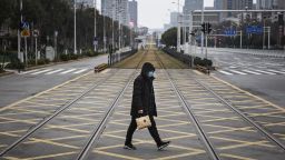 WUHAN, CHINA - FEBRUARY 07:  A resident walks across an empty track on February 7, 2020 in Wuhan, Hubei province, China. The number of those who have died from the Wuhan coronavirus, known as 2019-nCoV, in China climbed to 636.  (Photo by Getty Images)