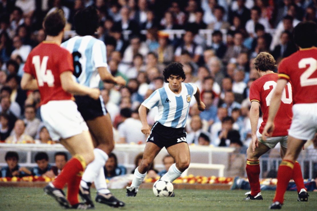 Maradona takes on the Belguim defence during the 1982 FIFA World Cup.
