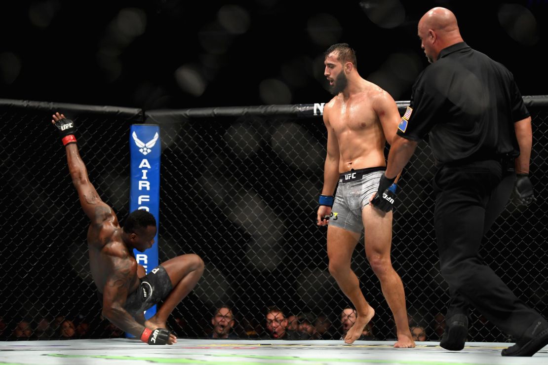 Reyes watches as Ovince Saint Preux falls to the mat.