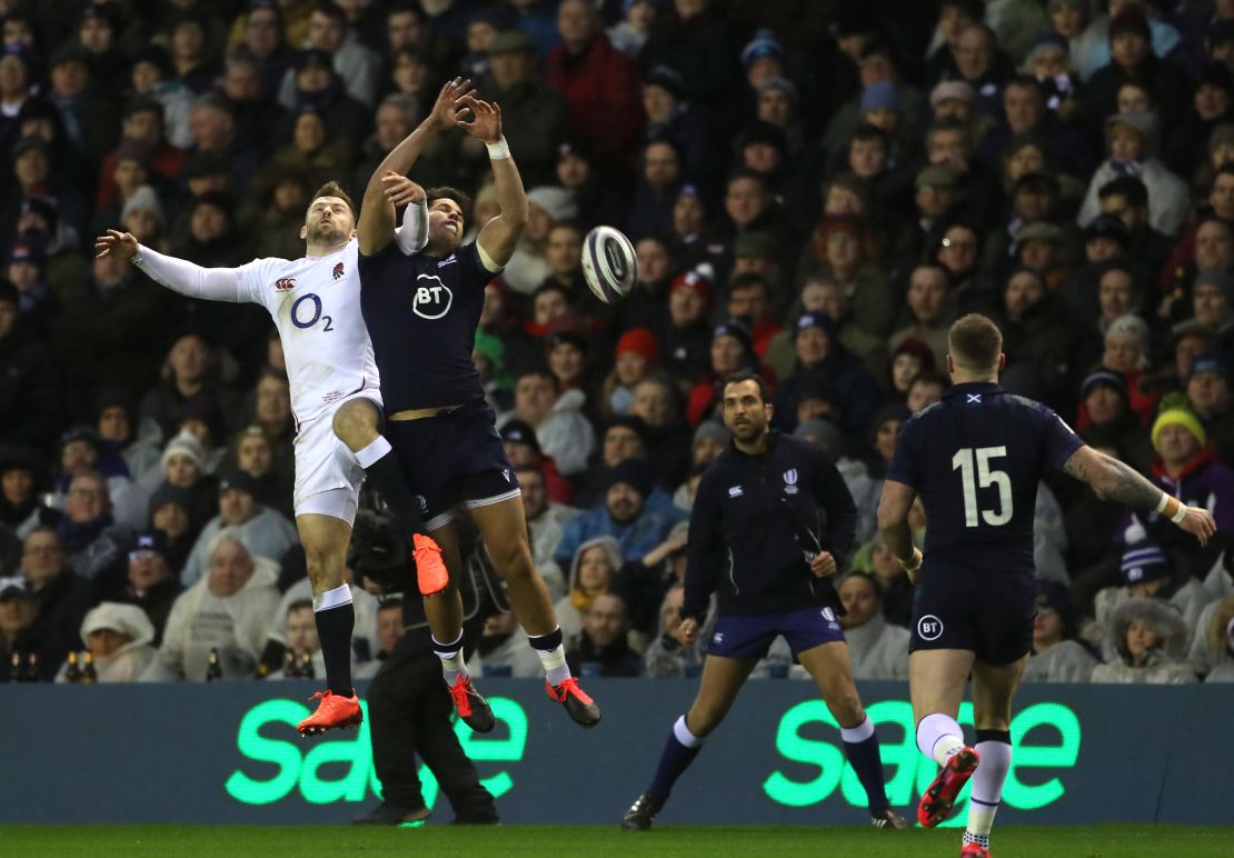 Sean Maitland of Scotland and Elliot Daly of England contest a high ball.